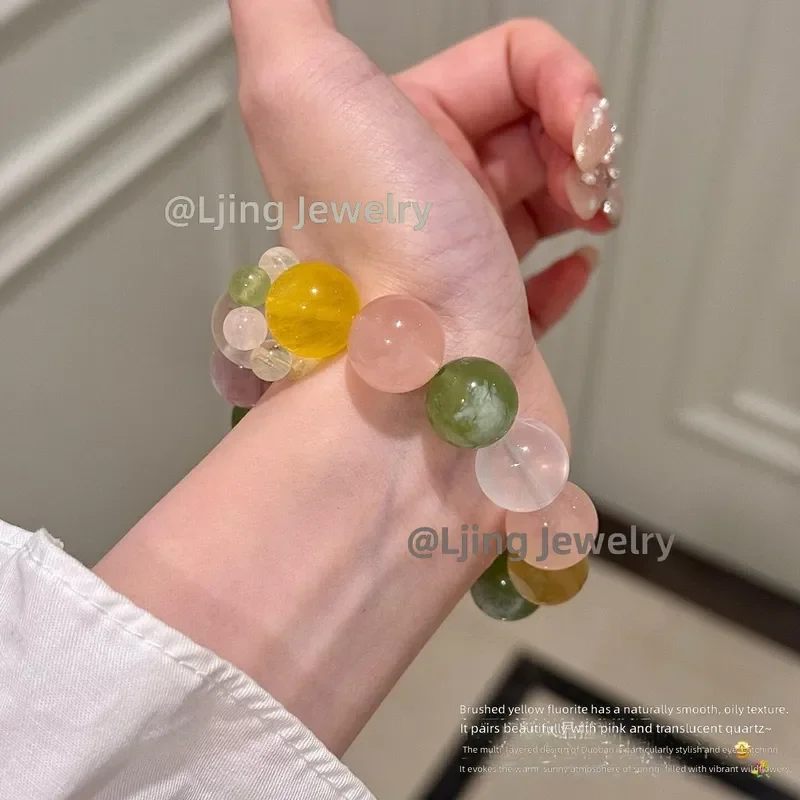 Natural Duobao crystal bracelet Xiuyu horse powder yellow gum flower yellow Asai bracelet gold lithium mica lucky transfer