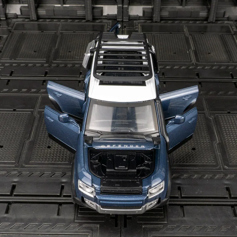 1:32 simulation Defender 110 alliage modèle de véhicule tout-terrain portes et capot avant et porte de coffre peut être ouverte de bonne qualité