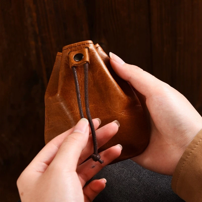 First layer cowhide change bag female mad horse leather high-end walnut bag male change earphones Wenwan storage genuine leather