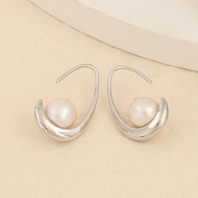 

S925 silver stud earrings for women temperament design drip-shaped baroque pearl eardrops personalized earrings