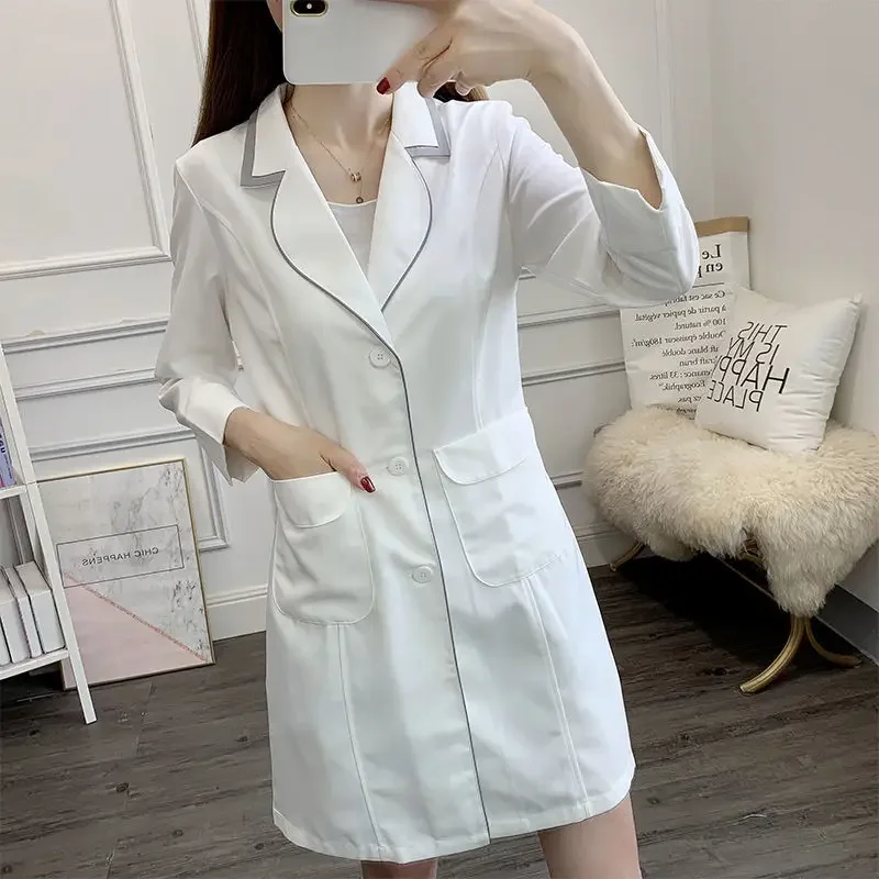 Uniformi corte abbigliamento da lavoro per donna abbigliamento di bellezza scrub per estetista abbigliamento da lavoro abito da salone di bellezza uniforme cappotto all'ingrosso