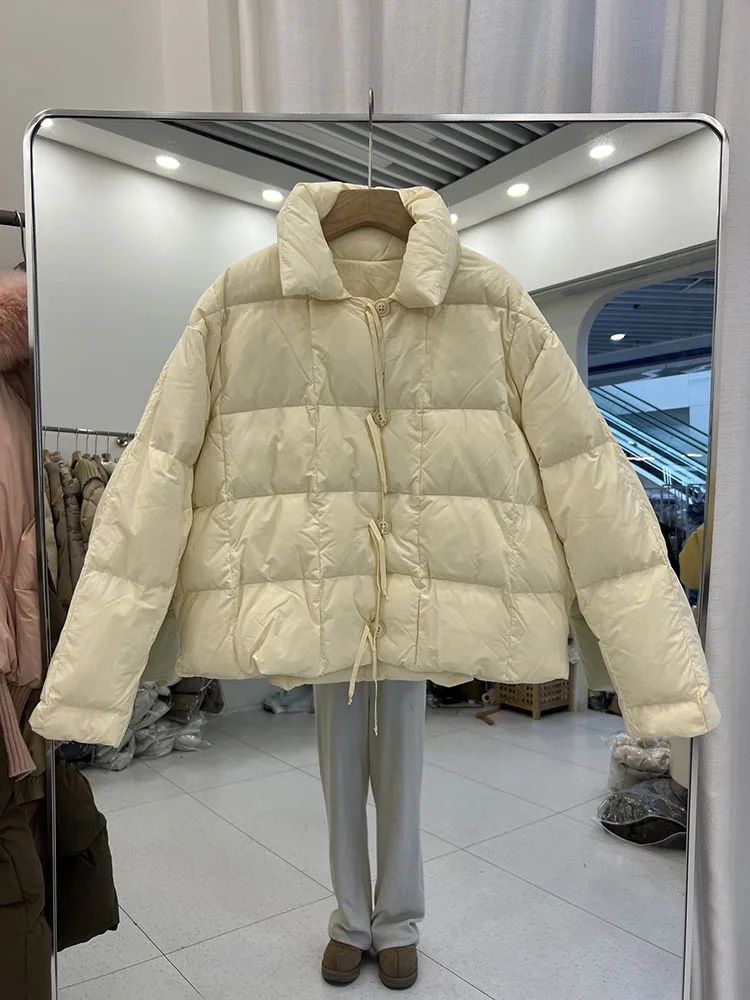 Hiver nouvelle doudoune femmes 2025 version coréenne col montant ample et à lacets décontracté blanc canard doudoune à la mode