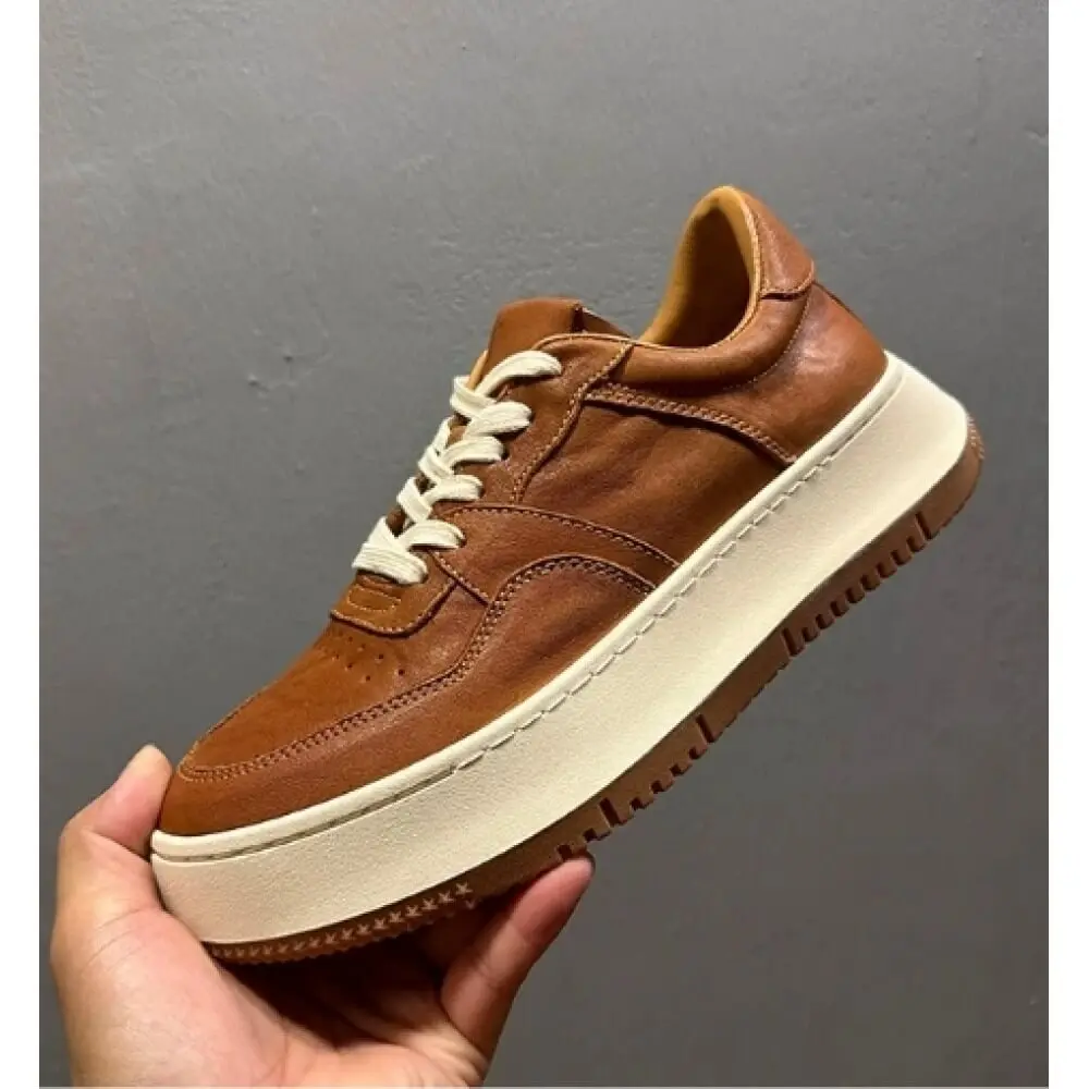 

Caramel Brown Burnished Leather Platform Sneakers, vintage style with off-white laces and thick sole,