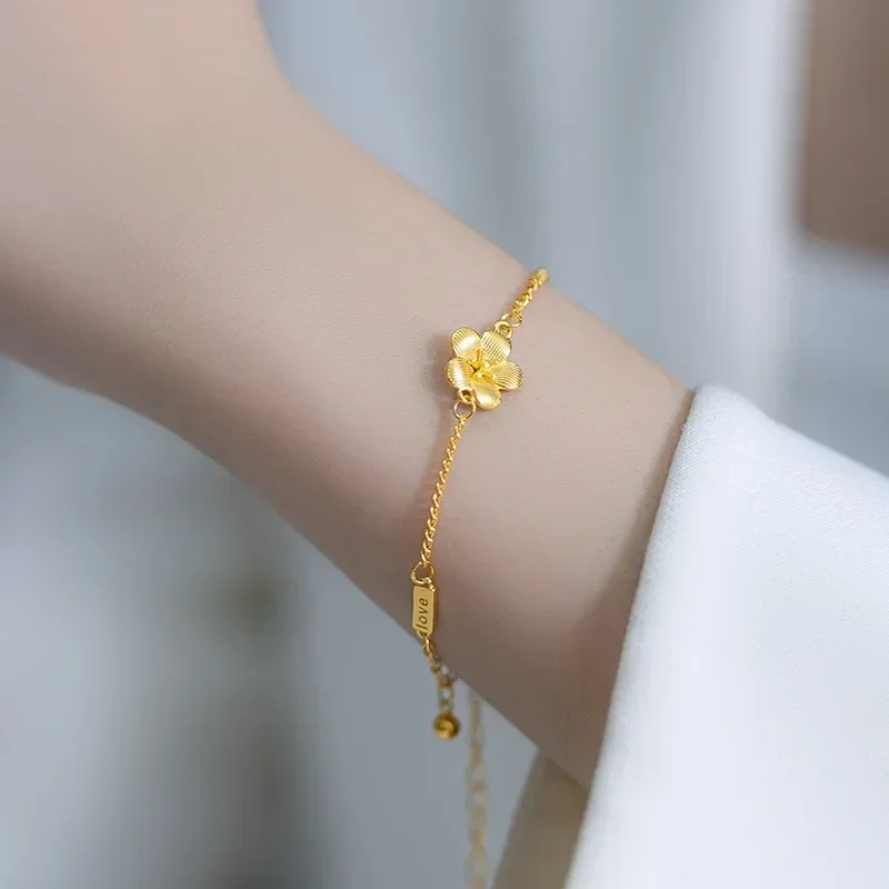 

9999 Real Gold 24K fashion commuter simple small peach blossom bracelet, gold niche high-end winter flower women's bracelet