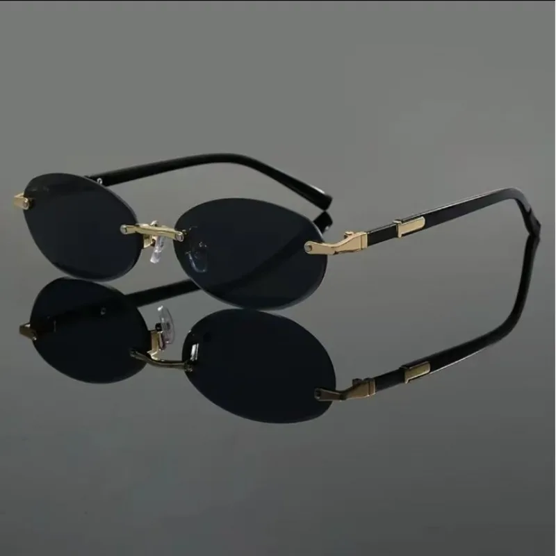 

Popular Punk Rimless Sunglasses Oval Fashion Women Men Shades Small Ellipse Sun Glasses for Female Male Party Traveling Oculos