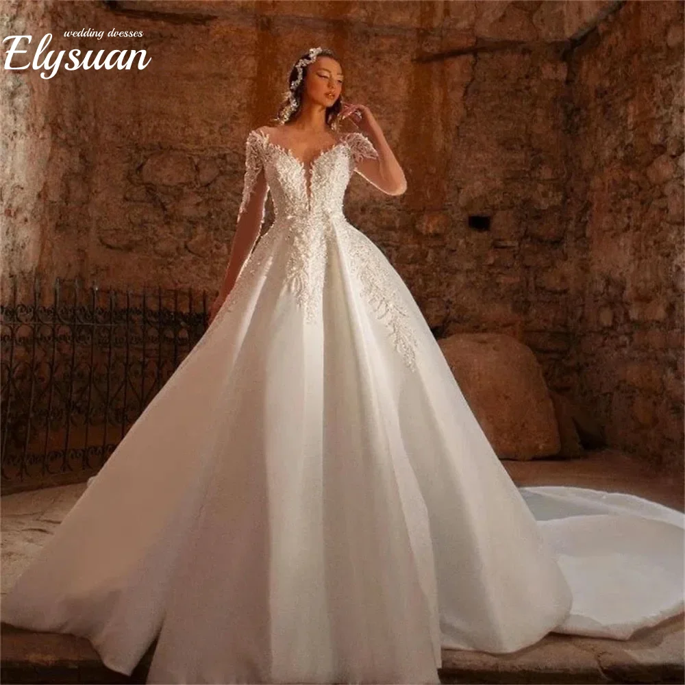 ชุดแต่งงานลูกปัดหรูหราสั่งทำพิเศษ แขนยาวแบบโปร่งแสง ประดับด้วยลายปัก พร้อมชายกระโปรงยาวแบบลากพื้น สำหรับเจ้าสาวไซส์พลัส