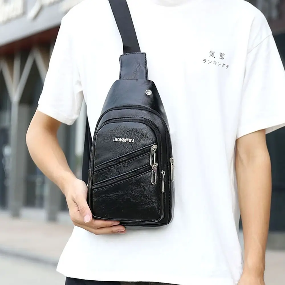 Solid Color Men\'s Sling Bag Fashion PU Leather Large Capacity Crossbody Bag with Earphones Hole Anti-theft Chest Bag