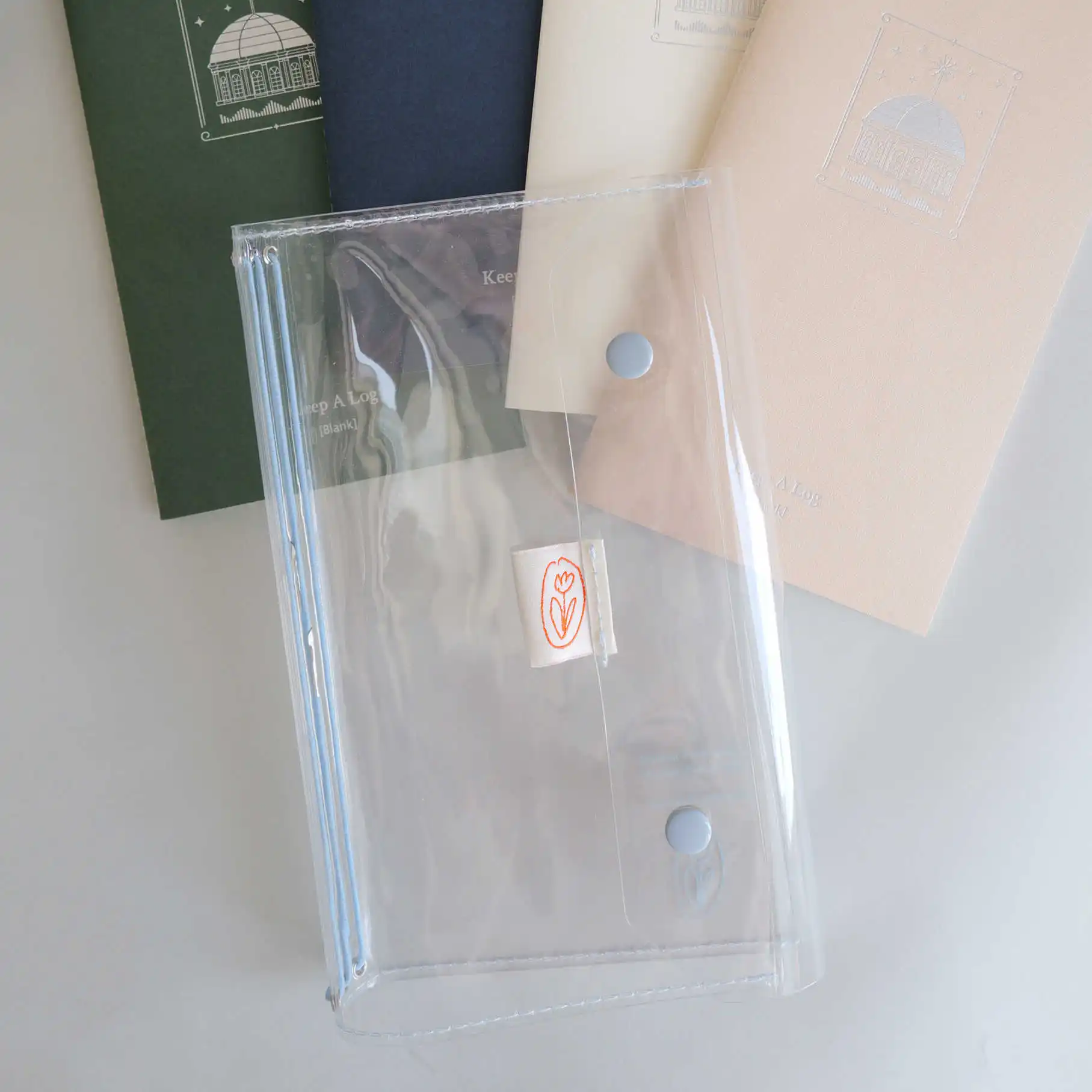 Organizer/Planer/Notes z przezroczystego PVC z logo tulipana z podwójnym guzikiem, na zdjęcia, z luźnymi kartkami, idealny na podróże. — zdjęcie produktu 4