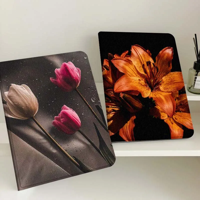 Three Tulips With D…