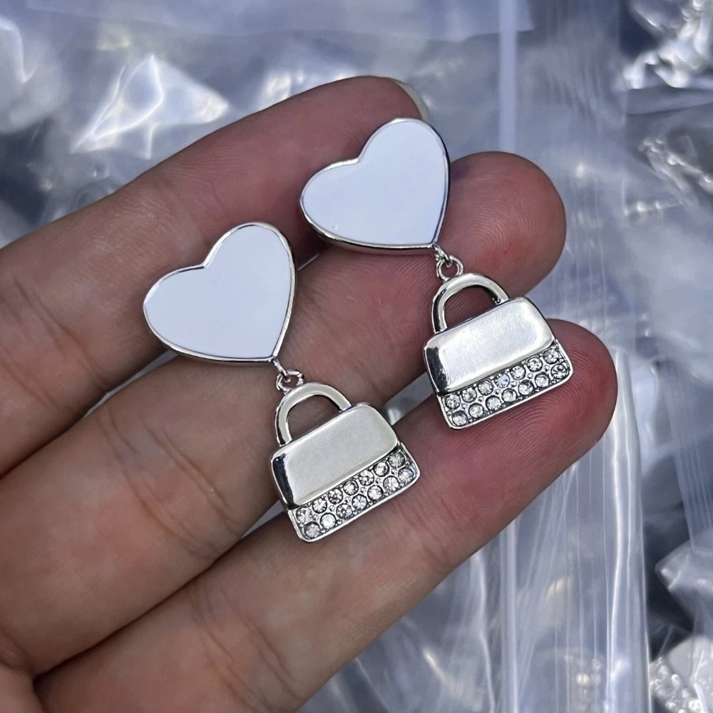 

2025 новые роскошные серьги изысканной ремесло уникальной формы, женские изящные темпераментные шикарные ювелирные изделия премиум-класса