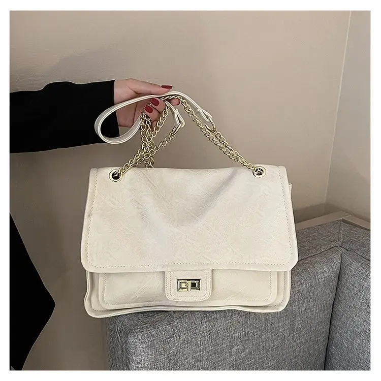 luxury-minimalist-diaper-bag-for-women-elegant-crossbody-bag-designer-vintage-tote-leather-with-unique-logo-detail