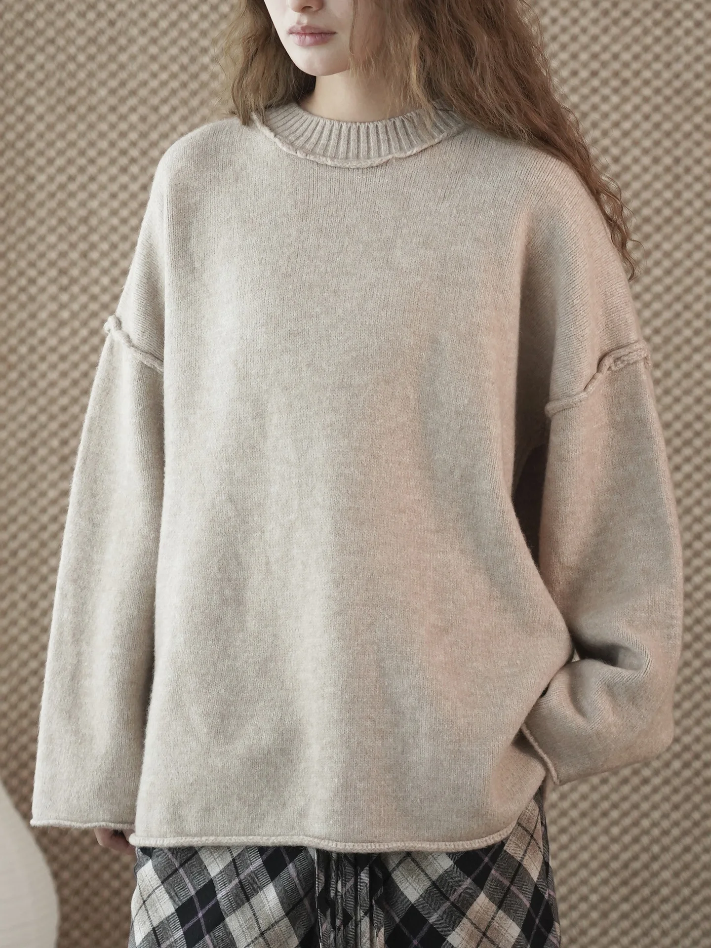 Winter neue koreanische Version einfacher Rundhals-Strickpullover mit leicht Fransen und lockerer und lässiger Silhouette für Frauen