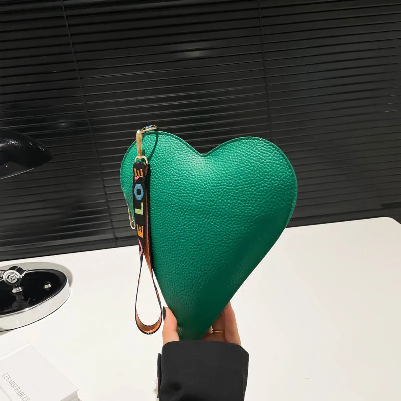 Heart-shaped wallets, heart-shaped handbags, jewelry and phone pouches, Valentine’s Day/Mother’s Day gift bags, and charm pouche