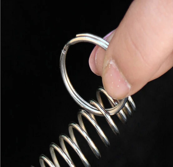 venta-al-por-mayor-envio-gratis-anillo-y-resorte-magico-juguetes-para-ninos-trucos-de-magia-escape-de-cirugia-accesorios-de-magia-de-primer-plano-yh161