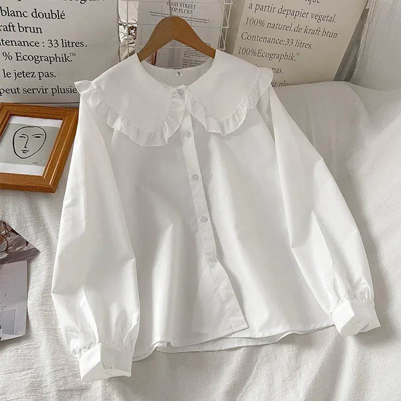 تنوعا طويلة الأكمام قميص أبيض المرأة أوائل الخريف جديد الفرنسية خمر تصميم فضفاض طبقات قميص الأميرة كم دمية طوق