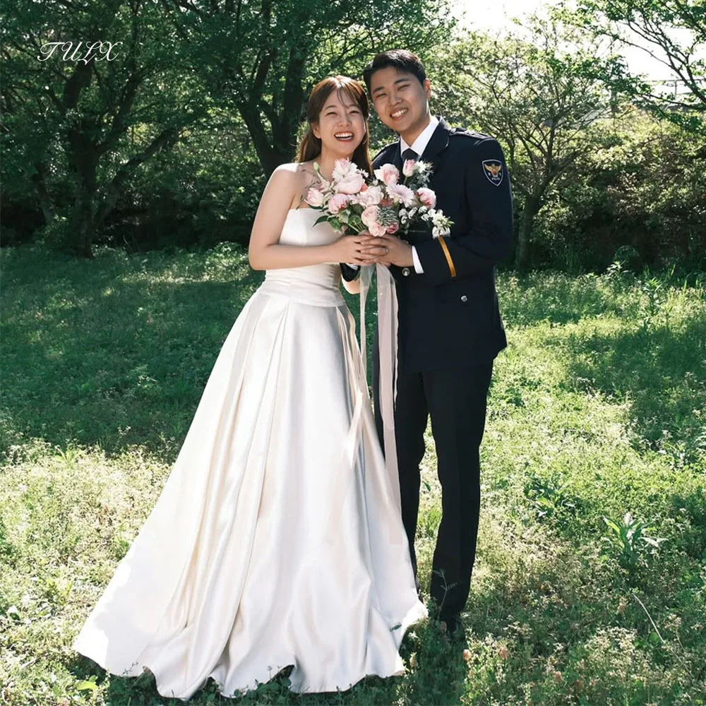 TULX Semplici abiti da sposa in raso avorio Corea Servizio fotografico all'aperto Senza spalline Una linea Abito da sposa lungo Corsetto Personalizzato nnegolare