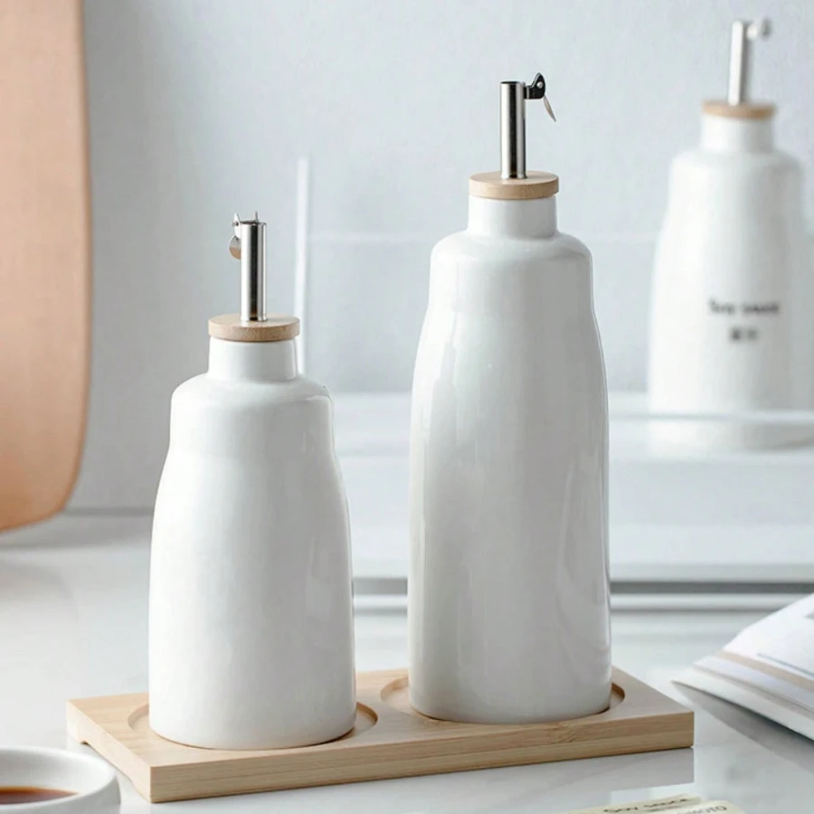 

Ceramic Oil Bottle Pot Soy Sauce Vinegar Leakproof Bottle Condiment Jar Creative Metal spout spice bottle‌ condiment dispenser