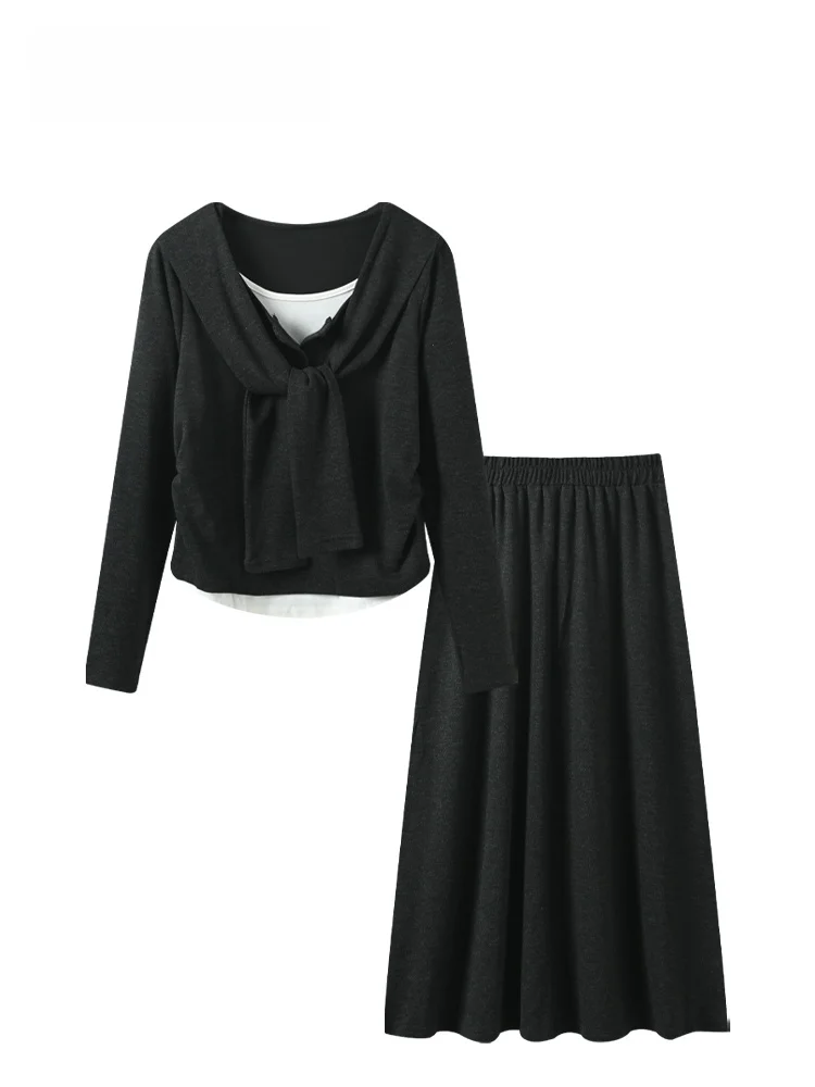 

Комплект из свободной футболки с длинным рукавом и юбки миди больших размеров: женская модная весенняя коллекция, удобный крой, комплект из двух предметов