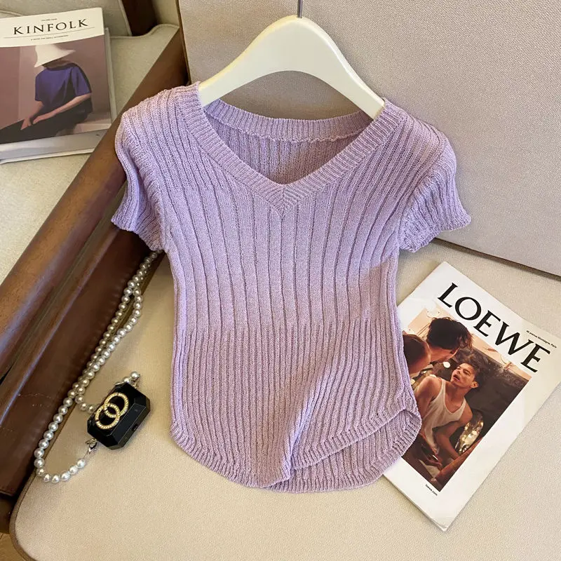 

V-neck short-sleeved sweater female 2024 summer new western style slim irregular chic fashion Joker slim short knit top.