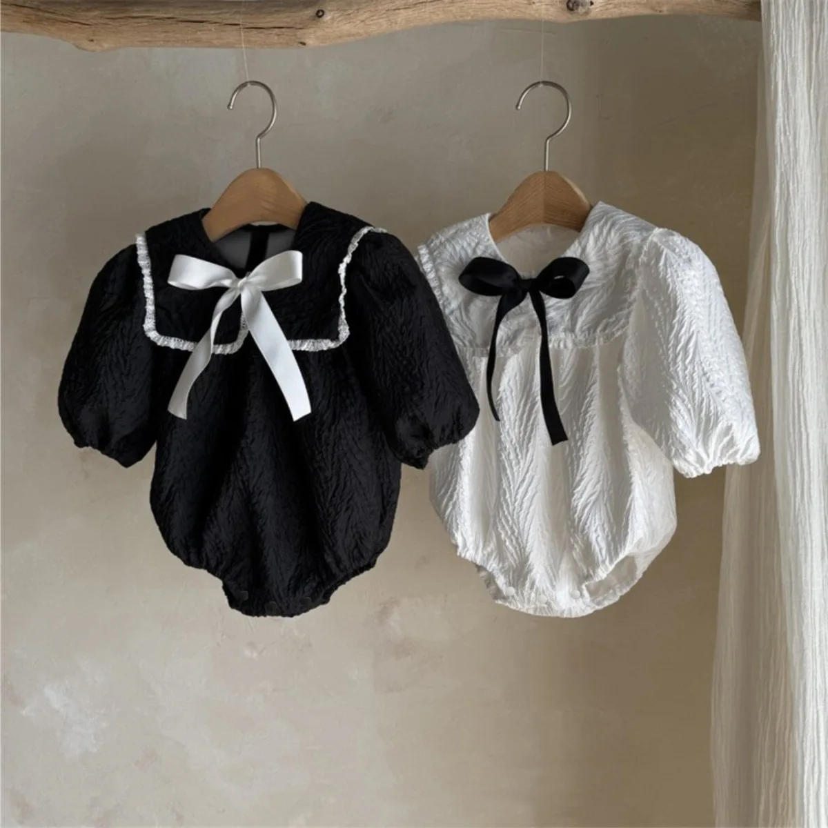 

2026 Spring New Baby Girl Long Sleeve Bodysuit Solid Girls Cute Bow Large Lapel Princess Jumpsuit Cotton Infant Clothes 0-24M