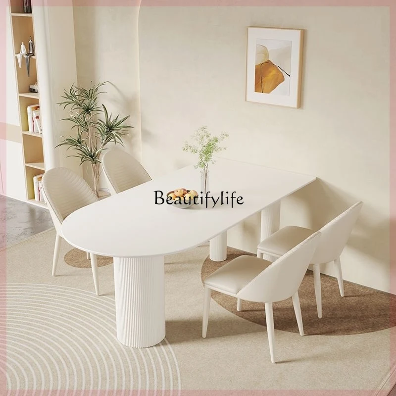 

-*Italian light luxury modern minimalist high-end rock slab dining table does not take up space rectangular dining table