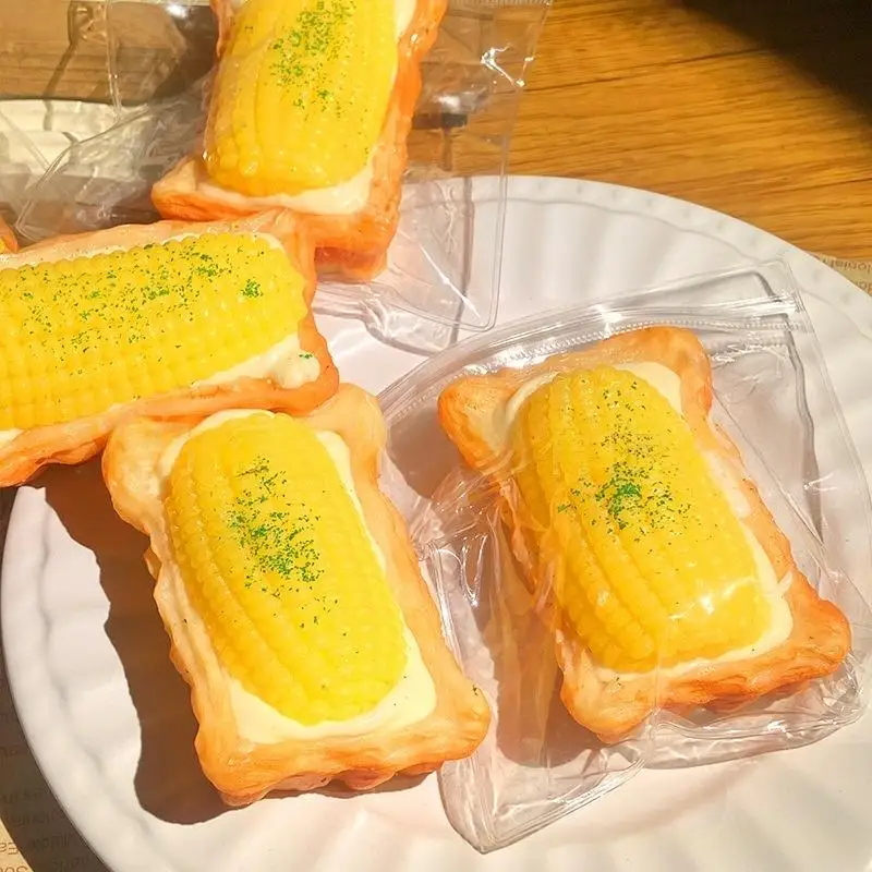 ของเล่นบีบมือทำเองรูปทาร์ตไข่ข้าวโพด 1 ชิ้น เนื้อนุ่มพิเศษ บรรเทาความเครียด ของเล่นบีบยืดหดได้สำหรับเด็ก ของเล่นดนตรีบีบอาหาร