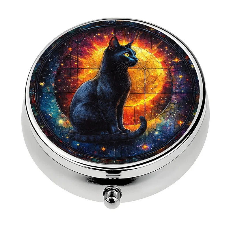 A small pill box with a black cat design, divided into three compartments, made of colored glass. This decorative storage box is perfect for storing vitamins and fits easily into a purse or bag, making it an ideal and unique gift.