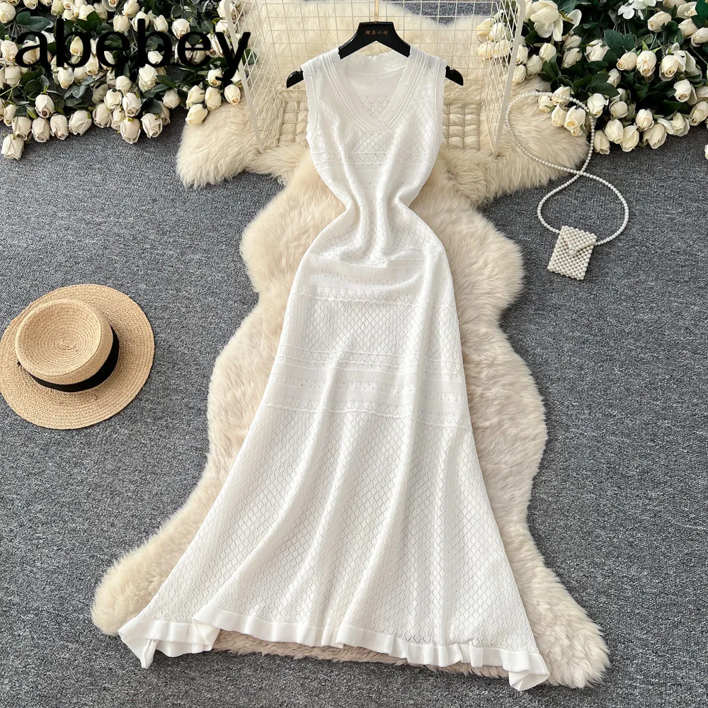 Weißes ärmelloses Maxikleid für Damen mit V-Ausschnitt, Häkelstrick, ausgehöhltem Rüschensaum, dehnbarem Strick, Strandkleid, langes Sommerkleid