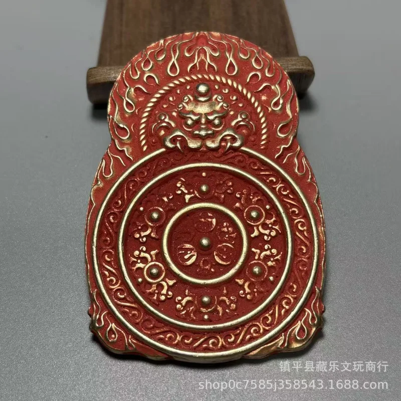 Antique relief cinnabar brass solid bronze plaque of Thousand-Handed Guanyin with a tiger head on the back, auspicious beast