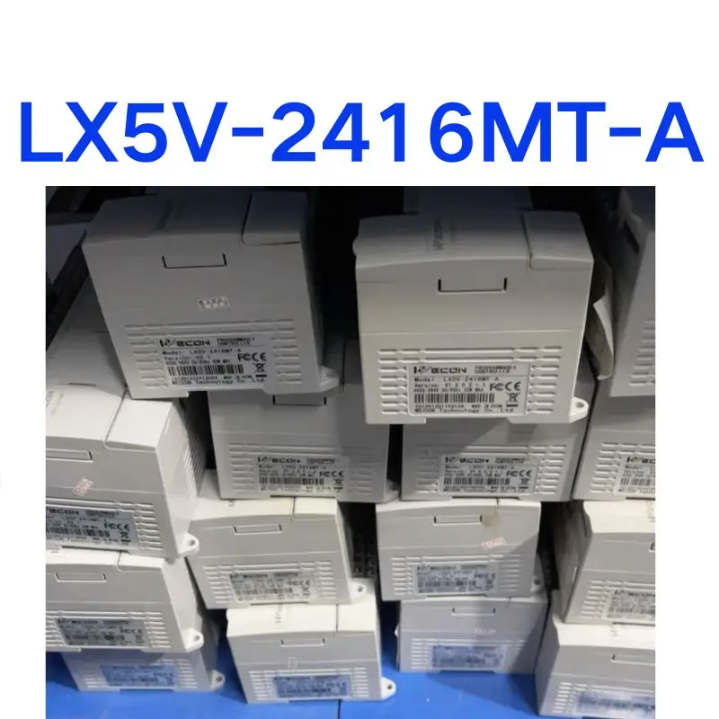 PLC usado LX5V-2416MT-A, teste, entrega rápida