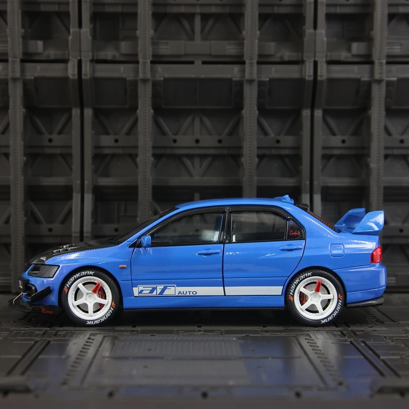 1:24 محاكاة ميتسوبيشي EVO 9th الجيل سبيكة نموذج سيارة زخرفة، الأبواب وغطاء المحرك، يمكن فتح صندوق السيارة، سيارة رياضية