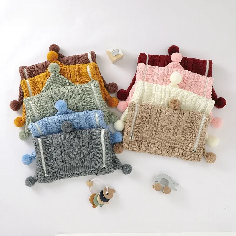 

2025 Newborn Baby Girl Boy Knitted Sleeping Bag Solid Color Cable Knit Warm Baby Nappy Bag Sleep Sack with Zipper and Pom Poms