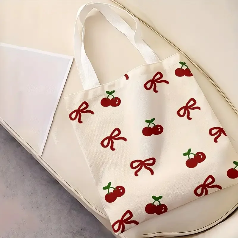 A Cherry print canvas tote bag, suitable for daily use, shopping, school, and travel