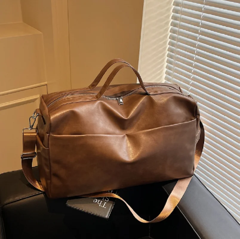 

2026 High Quality Fashion Vintage Large Capacity Travel Totes Men Women's Business Soft Leather Shoulder Bags Sports Fitness Bag