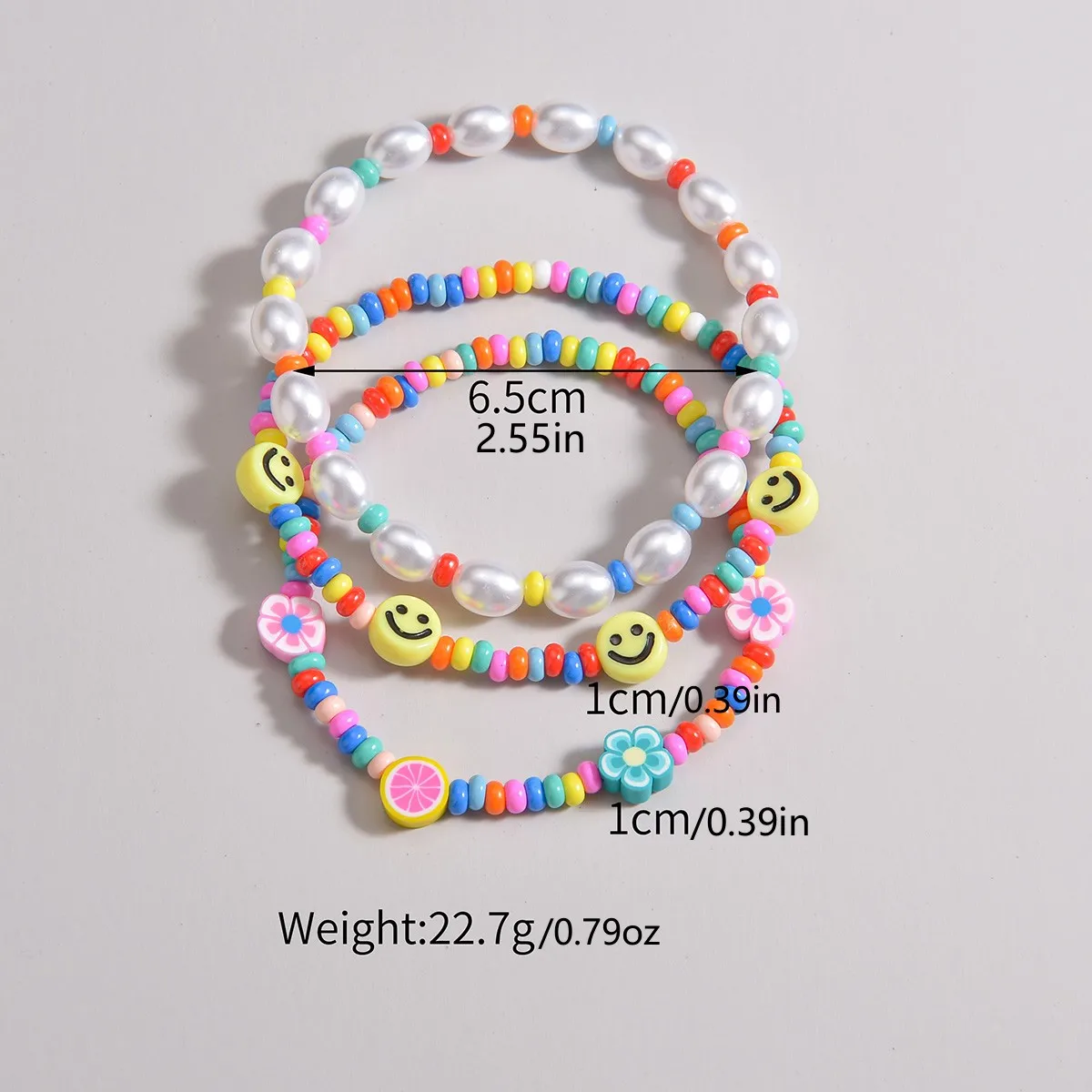 3-piece set of Bohemian style colorful rice beads mixed with smiling face pearls, multiple layered women\'s anklets