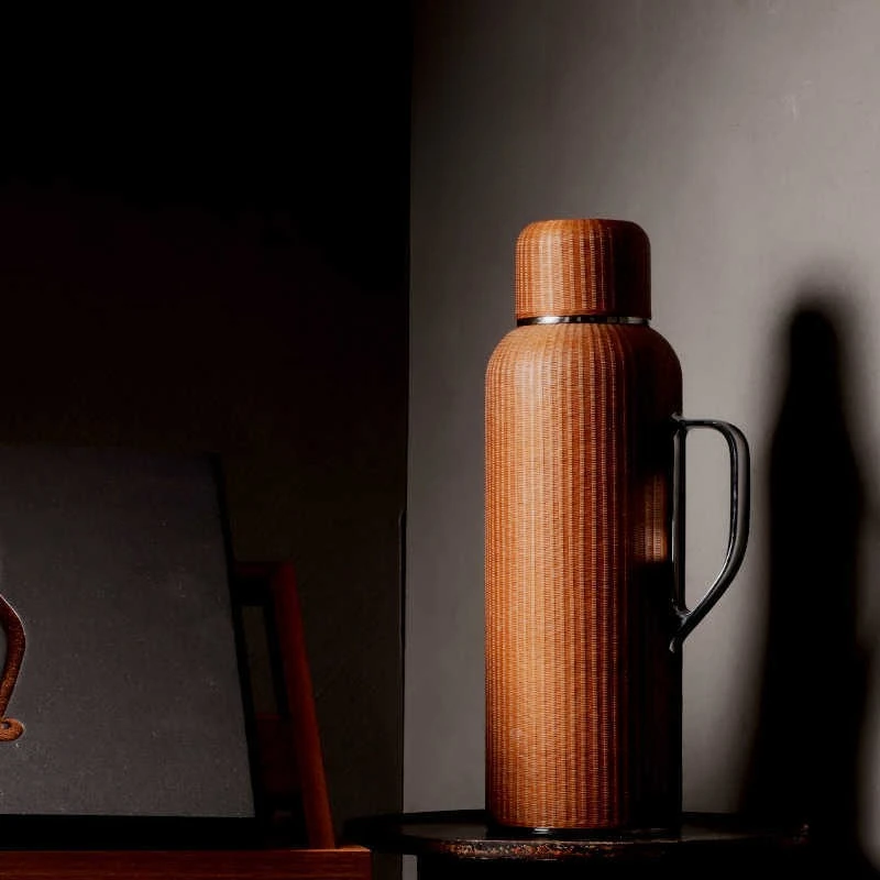 

Intangible cultural heritage buckle silk bamboo woven pure titanium collection thermal insulation pot leather bag 1.4L