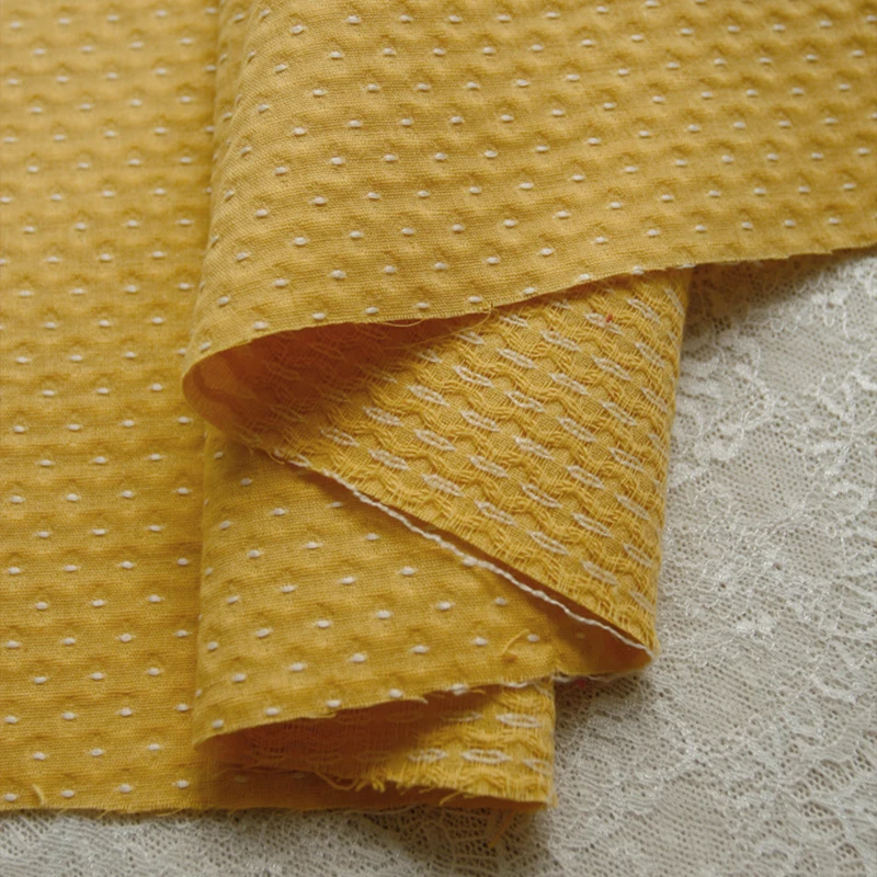 50 cm süße Schneesamen Stickerei Dot Jacquard Baumwollstoff Retro Kinderkleidung Puppenkleidung handgemachte DIY Stoff 140 cm breit