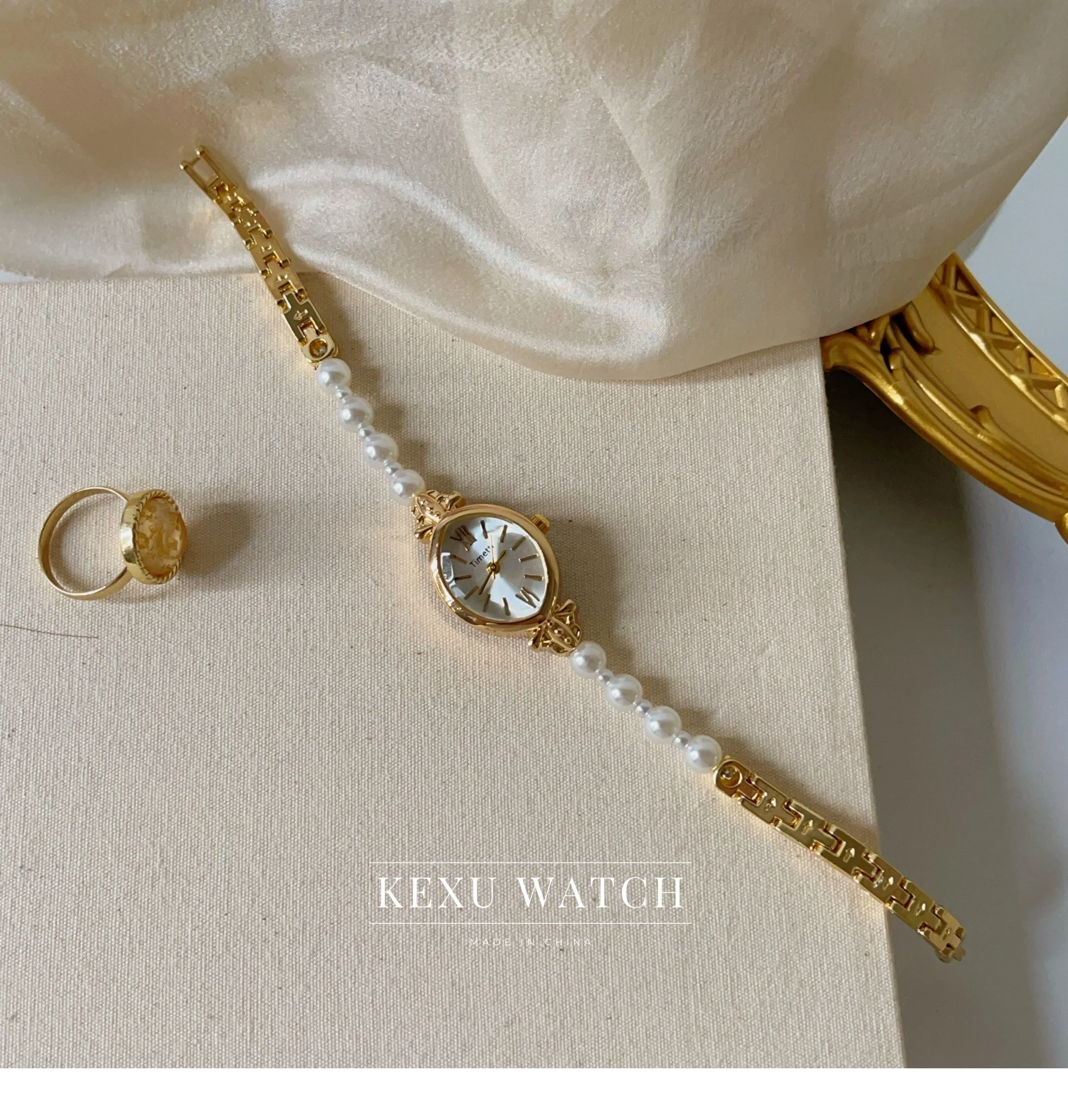 ساعة تيميتي للنساء، ساعة نسائية بسوار من اللؤلؤ مستوحاة من الطراز القديم، ساعة نسائية على الموضة ذات وجه بيضاوي للبيع بالجملة