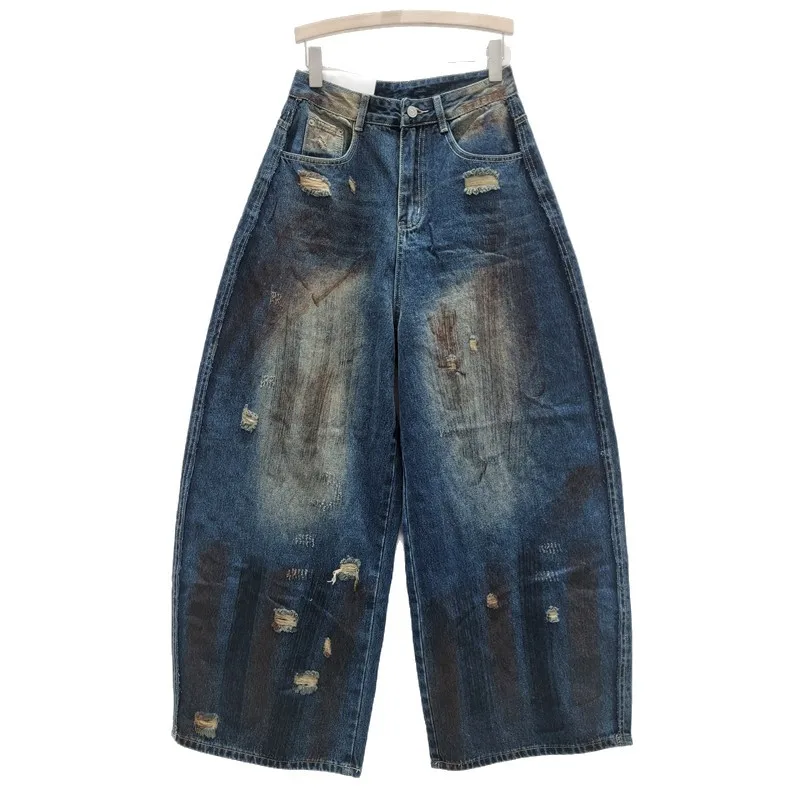 Spodnie damskie na jesień 2025, nowa moda, uniwersalne, wyszczuplające, luźne, z szerokimi nogawkami, jeansy w stylu vintage z efektem zniszczenia.