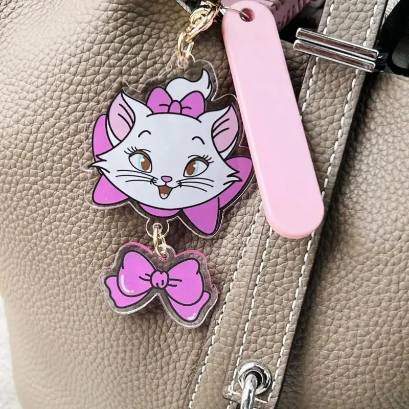 Disney Marie Cat portachiavi acrilico Kawaii Anime Cartoon Design creativo arco in Pvc portachiavi ciondolo zaino decorazione ragazza regali