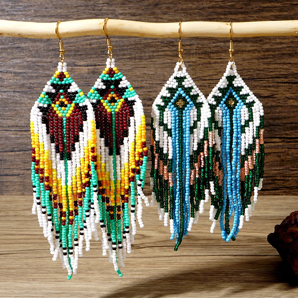 

Beaded earrings Tassel Geometry Design Innovate Gradient Hand knitting Bohemia Alloy Tide Simple Rice bead earrings