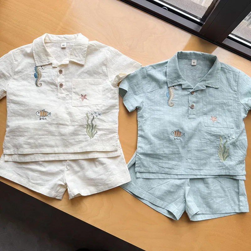 

Новый летний комплект детской одежды 2026 года, 1-9 лет, хлопковый тонкий повседневный костюм с вышивкой животных: рубашка для девочек + шорты для мальчиков, 2 предмета