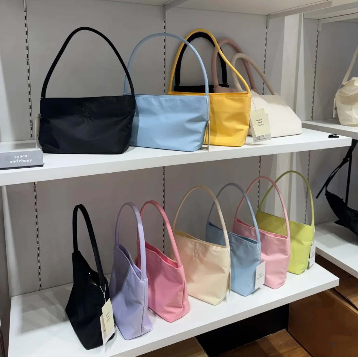 

Brand Mucu And Ebony Embroidered Letter Candy Colored aron Handheld Underarm Bag Soft Nylon Material Daily Use