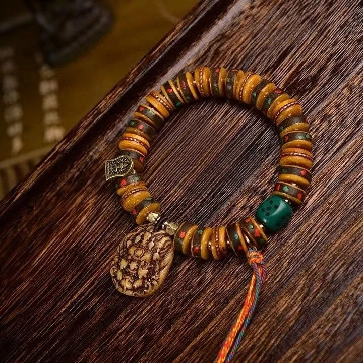 

Tibetan people returning with camel bones, old copper inlaid with multiple treasures, holding cultural relics and jewelry