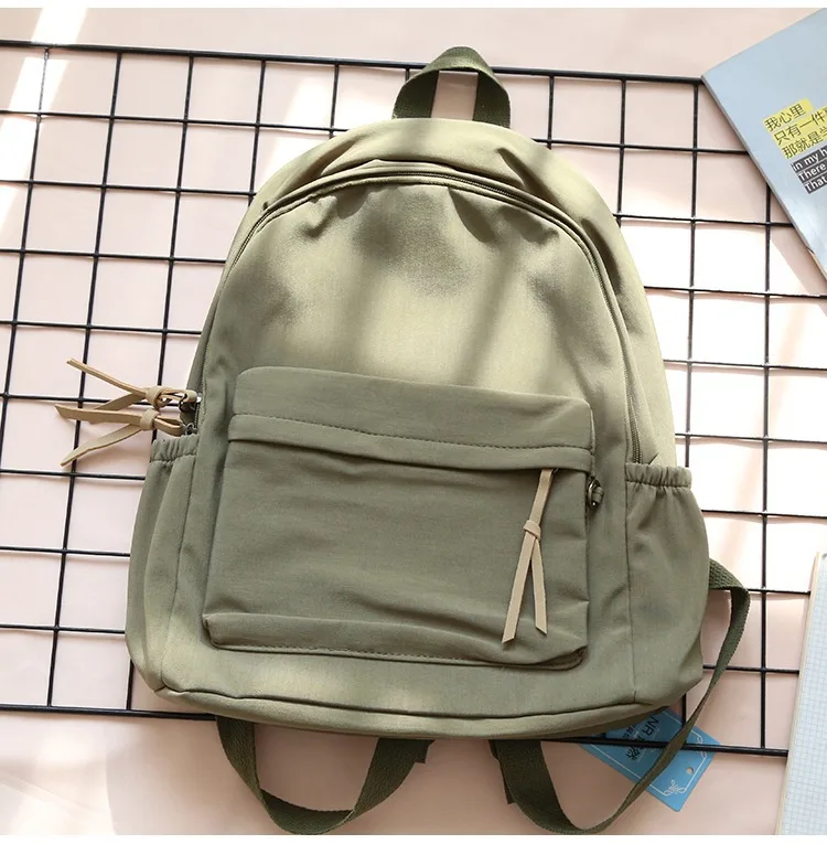 Damen-Rucksack aus Segeltuch, lässige, minimalistische Schultasche mit Vordertasche und seitlichem Kordelzug, leichter Reise-Tagesrucksack