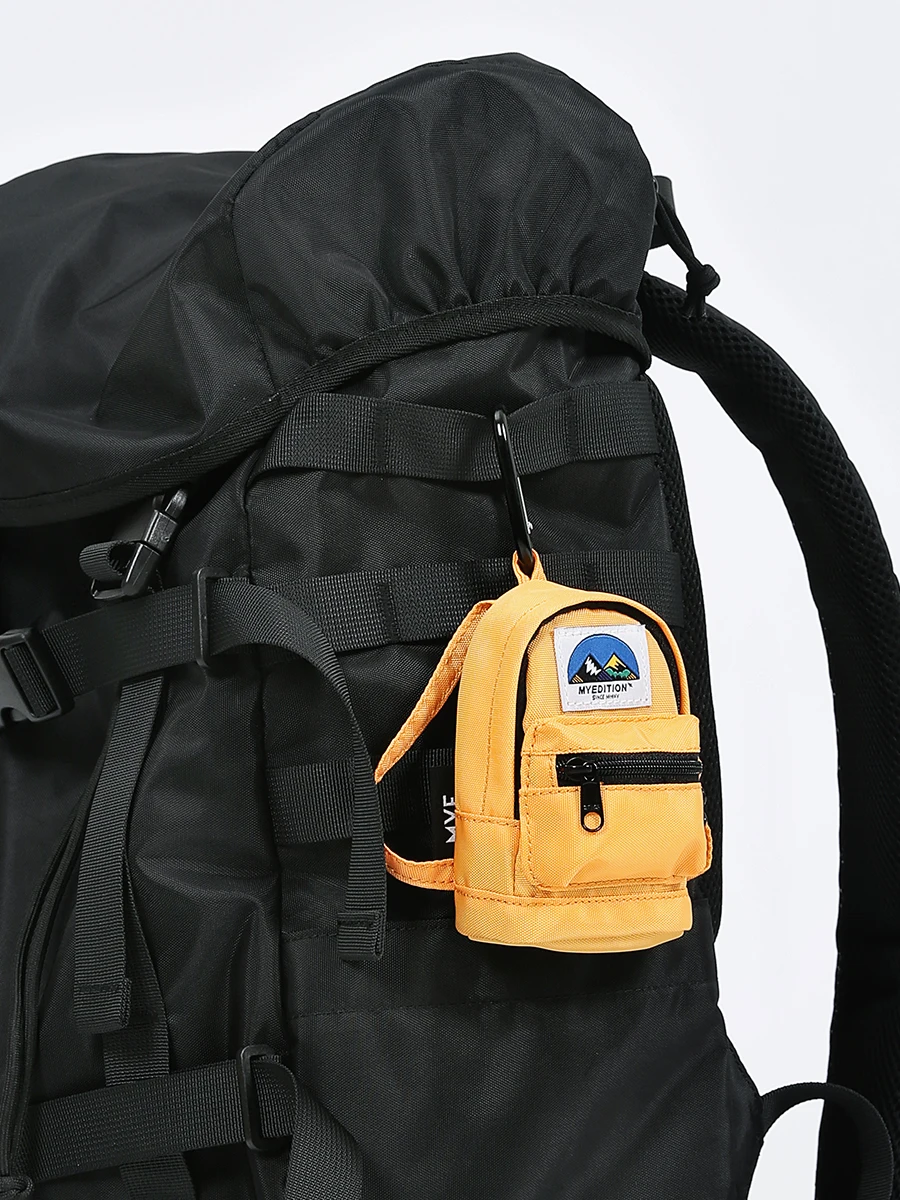 

Keychain pendant, card bag, Japanese and Korean tooling retro multi-color earphone bag.