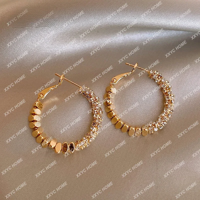 

Gold broken silver unique circle earrings women's niche, high-end studs, new popular earrings