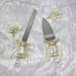 A box of wedding cutlery. Match with a gold bow and love wedding gift. Perfect for cake cutting, wedding season and engagement,