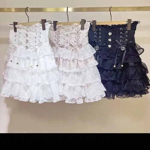 Minifalda japonesa de estilo dulce Lolita para mujer, faldas elegantes de encaje con vendaje para fiesta y pastel, falda gótica Y2k con hebilla de Metal