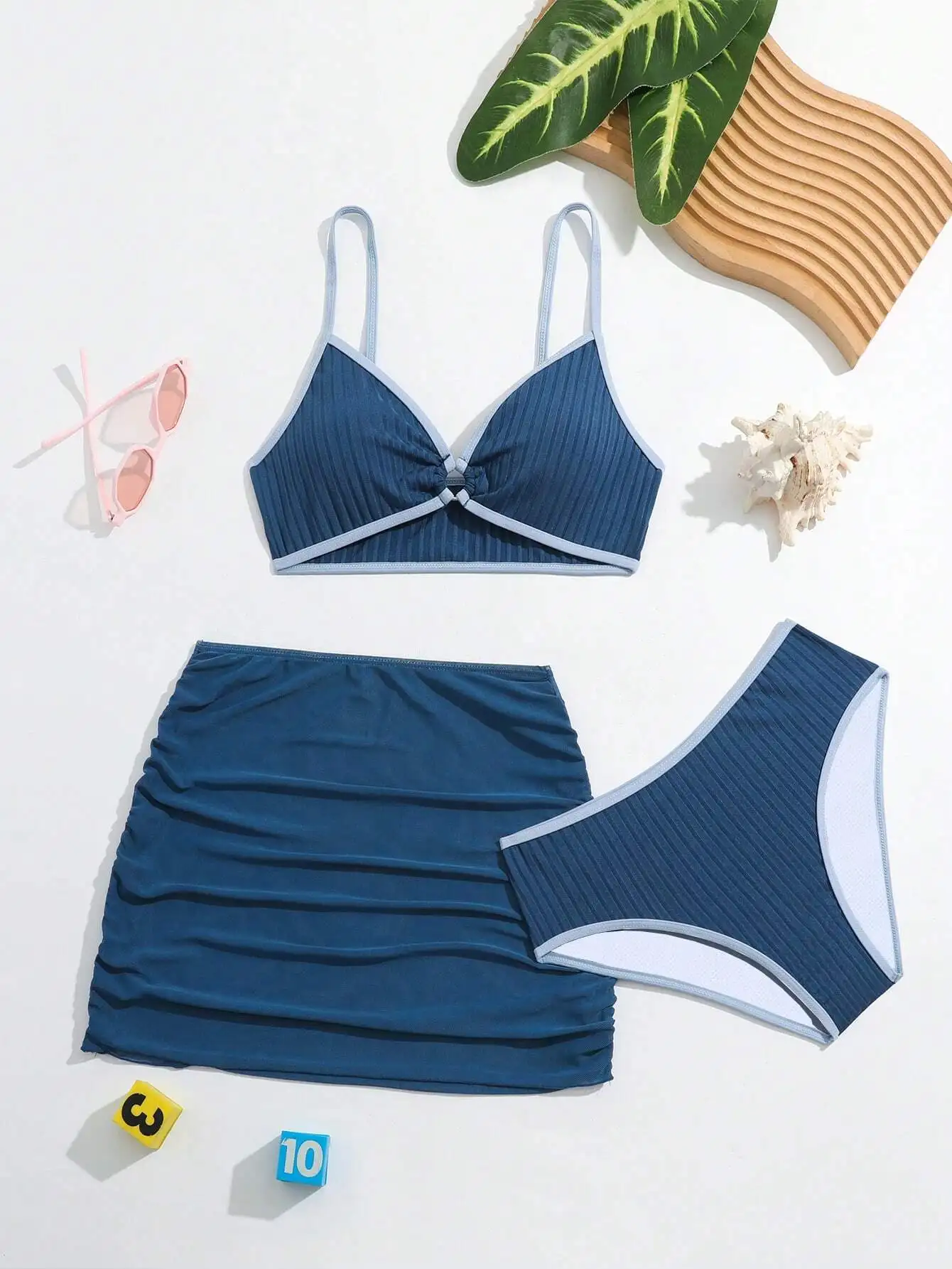 

Женский комплект из 3 предметов: синий купальник в рубчик с юбкой и топом с завязками